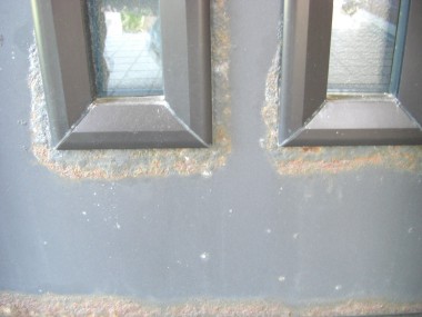 玄関ドア　塩害による錆　再生リフォーム